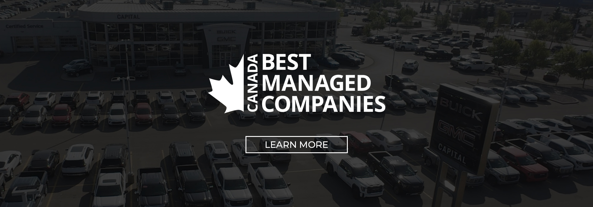 Aerial view of a car dealership with "Canada's Best Managed Companies" text overlay.